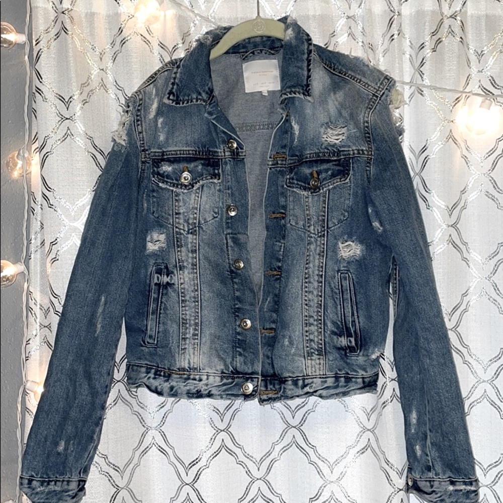 Distressed jean jacket